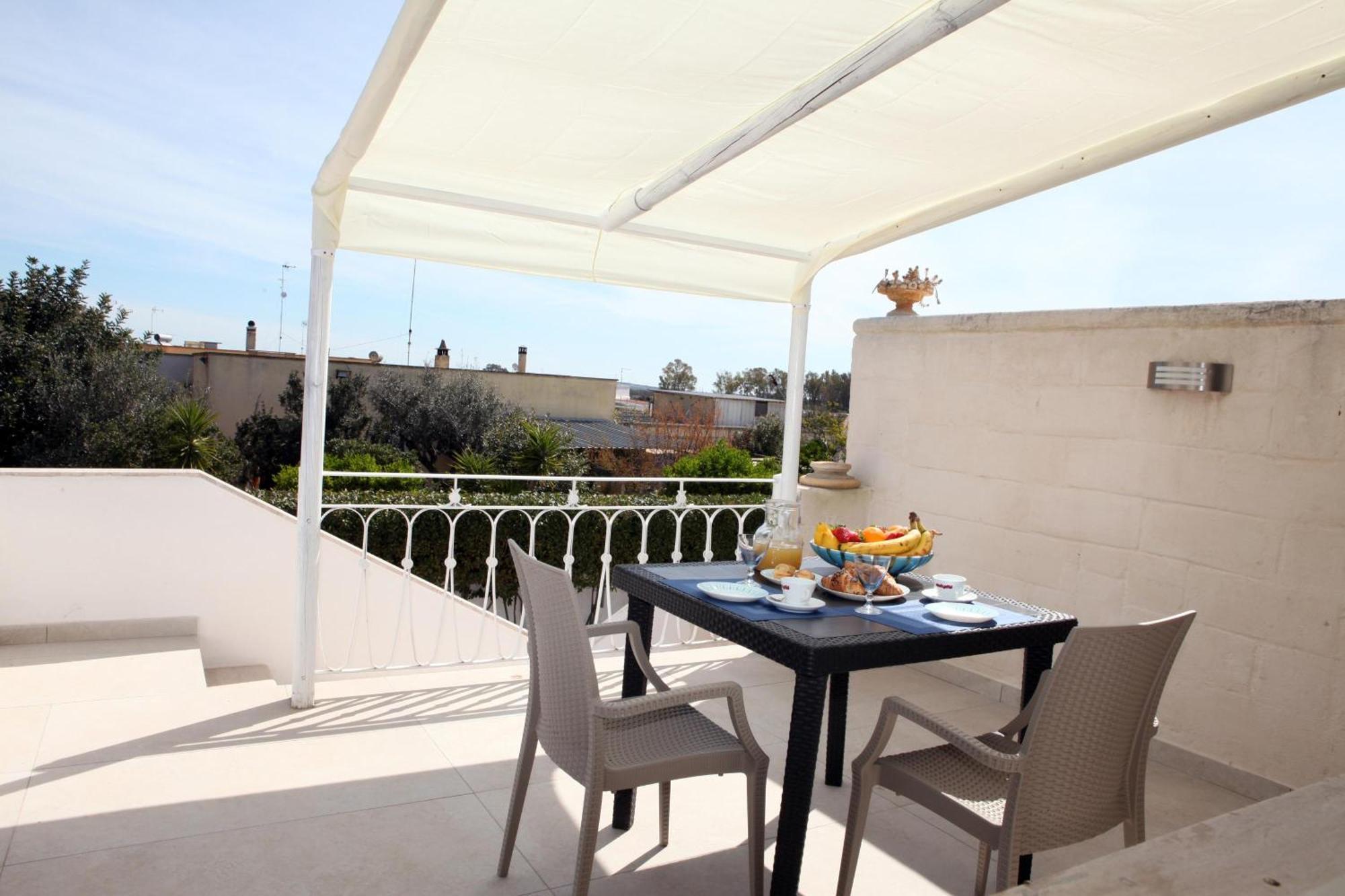 Pino Resort With Shared Pool Torre Lapillo Exterior photo